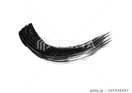 Black mascara brushstroke swatch isolated on white background. Cosmetic mascara smudged smear for design. Black mascara brushstroke swatch isolated on white background. Cosmetic mascara smudged smear for design. 105936487