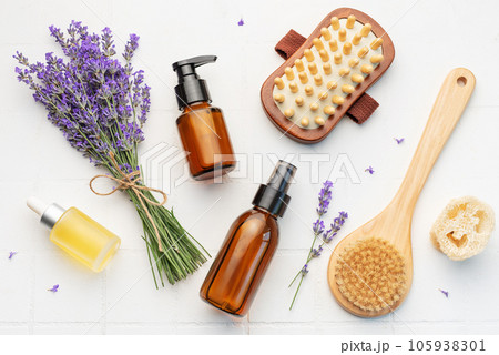 Lavender spa. Lavender salt, natural essential oil, massage brushes and fresh lavender Lavender spa. Lavender salt, natural essential oil, massage brushes and fresh lavender 105938301
