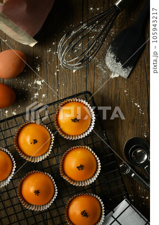 Delicious homemade Chinese pastry with stuffed salted yolk. Traditional dessert for Chinese Mid-Autumn festival or afternoon tea Delicious homemade Chinese pastry with stuffed salted yolk. Traditional dessert for Chinese Mid-Autumn festival or afternoon tea 105943217