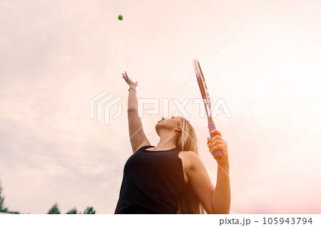 Tennis tournament. Female player at the clay tennis court 105943794