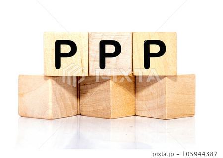 Paycheck Protection Program PPP inscription on wooden cubes on a white background Paycheck Protection Program PPP inscription on wooden cubes on a white background 105944387