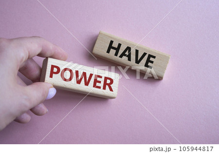Have power symbol. Wooden blocks with words have power. Businessman hand. Beautiful pink background. Business and have power concept. Copy space. 105944817