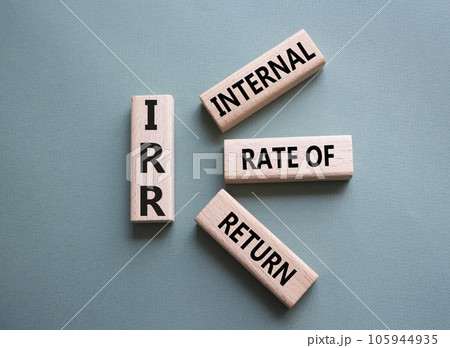 IRR - Internal Rate of Return symbol. Concept word IRR on wooden cubes. Beautiful grey green background. Business and IRR concept. Copy space. IRR - Internal Rate of Return symbol. Concept word IRR on wooden cubes. Beautiful grey green background. Business and IRR concept. Copy space. 105944935