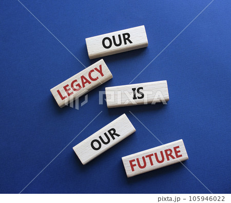 Our Legacy is our Future symbol. Concept words Our Legacy is our Future on wooden blocks. Beautiful deep blue background. Business and Our Legacy is our Future concept. Copy space 105946022