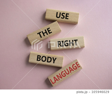 Use the righ Body Language symbol. Concept words Use the righ Body Language on wooden blocks. Beautiful pink background. Business concept. Copy space Use the righ Body Language symbol. Concept words Use the righ Body Language on wooden blocks. Beautiful pink background. Business concept. Copy space 105946029