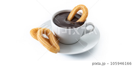 Traditional Spanish churros with hot chocolate isolated on white background 105946166