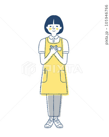 胸で手をあわせるエプロン姿の女性 i- 20 胸で手をあわせるエプロン姿の女性 i- 20 105946766