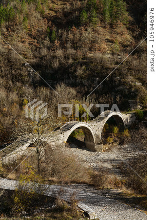 View of the traditional stone Kalogeriko or Plakida Bridge View of the traditional stone Kalogeriko or Plakida Bridge 105946976