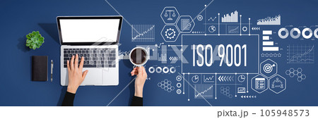 ISO 9001 theme with person using laptop computer 105948573