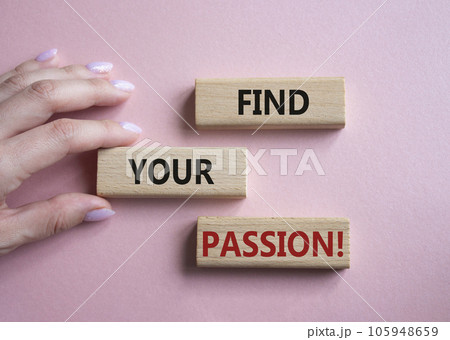 Find your passion symbol. Concept words Find your passion on wooden blocks. Businessman hand. Beautiful pink background. Business and Find your passion concept. Copy space. 105948659