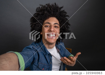 Young guy making selfie and looking excited 105948963