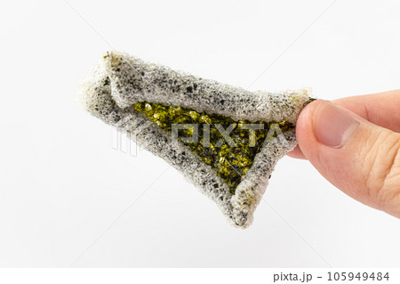 Glutinous rice fried seaweed snack on white background Glutinous rice fried seaweed snack on white background 105949484