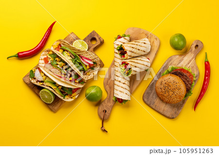 Mexican food featuring tacos, burritos, nachos, burgers 105951263