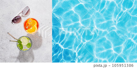 Refreshing cocktail by the pool on a sunny day Refreshing cocktail by the pool on a sunny day 105951386
