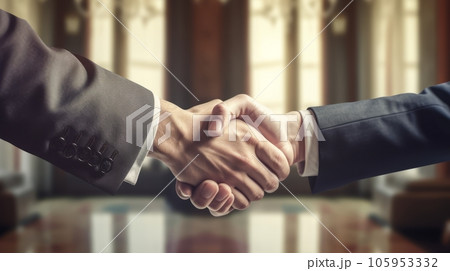 Close-up of a handshake of men in business suits against the background of a luxurious wooden office 105953332
