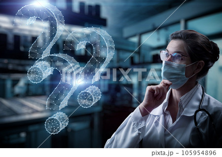 A laboratory assistant is looking for an answer to questions. A laboratory assistant is looking for an answer to questions. 105954896