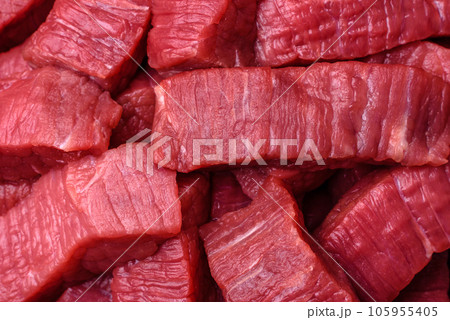 Juicy fresh raw beef meat with salt, spices and herbs Juicy fresh raw beef meat with salt, spices and herbs 105955405