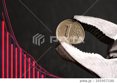 Wrench holds the Russian ruble, The idea of the collapse of the ruble, and economy, sanctions against Russia, economic crisis in Russia due to the war in Ukraine Wrench holds the Russian ruble, The idea of the collapse of the ruble, and economy, sanctions against Russia, economic crisis in Russia due to the war in Ukraine 105957180