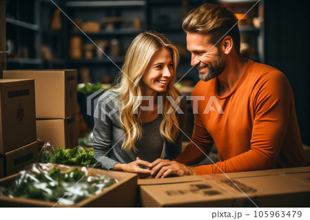 A couple unpacking furniture and opening boxes in their new home after moving. Generative AI 105963479