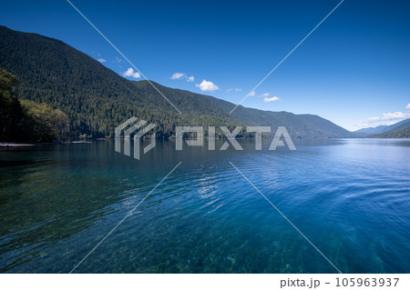 Tranquil summer afternoon on Lake Crescent in Olympic National Park, Washington. Tranquil summer afternoon on Lake Crescent in Olympic National Park, Washington. 105963937