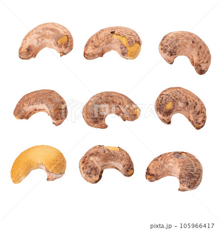 Roasted cashew nuts isolated on a white background. 105966417
