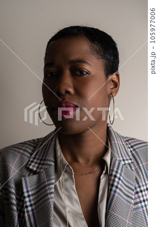 Serios young adult black woman portrait Serios young adult black woman portrait 105977006