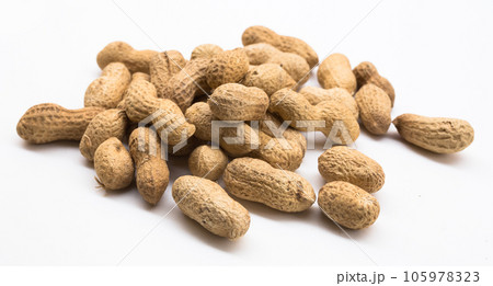 Bunch of ecological peanuts on a white background 105978323
