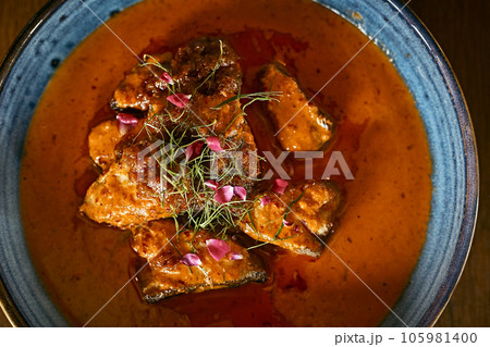 Fried Fish with Thai Red Curry Sauce Fried Fish with Thai Red Curry Sauce 105981400