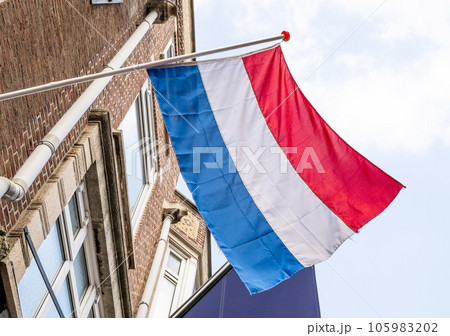 Flag in Amsterdam sky at netherlands street 105983202
