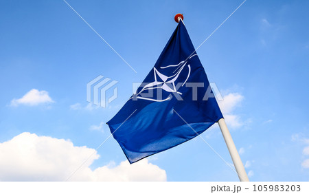 NATO flag in sky 105983203