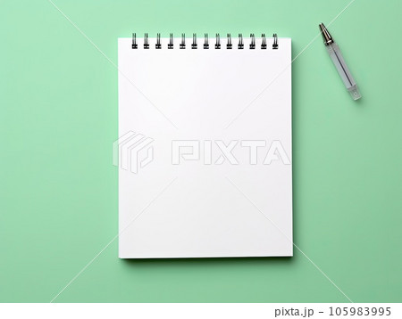 Top view blank paper Notebook and pen. Desktop mock up, Flat lay of green working table background with office equipment, mockup greeting card. 105983995