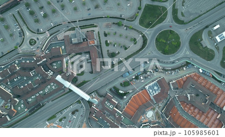 Aerial top down shot of a European commercial area full of vacant parking places 105985601