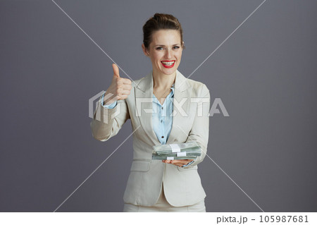 happy trendy female employee showing thumbs up 105987681