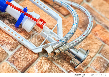 Plumbing. Flexible metal steel faucet hoses, flush mechanism, siphon fittings Plumbing. Flexible metal steel faucet hoses, flush mechanism, siphon fittings 105988385