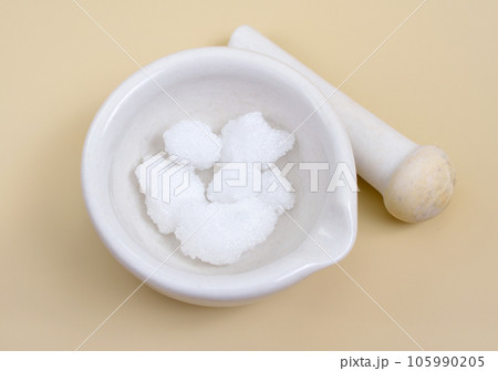 Camphor is a waxy, colorless solid with a strong aroma Camphor is a waxy, colorless solid with a strong aroma 105990205