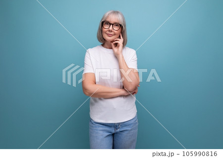 portrait of healthy mature lady in menopause age on studio background with mocap portrait of healthy mature lady in menopause age on studio background with mocap 105990816