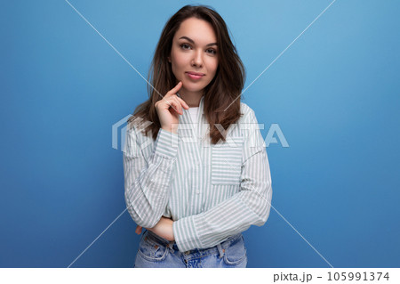 charming young brunette female adult with chic silky healthy hair below her shoulders in a studio charming young brunette female adult with chic silky healthy hair below her shoulders in a studio 105991374