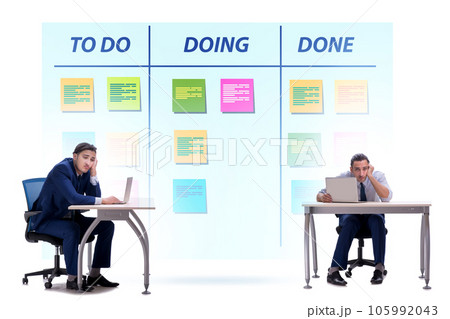 Businessman working on kanban board with tasks 105992043