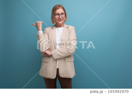 business 50s adult woman with a bob hairstyle in a trendy jacket on a bright background with copy business 50s adult woman with a bob hairstyle in a trendy jacket on a bright background with copy 105992970