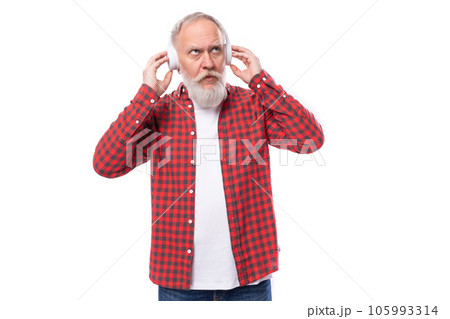 music lover 60c retired man with white beard and mustache with headphones music lover 60c retired man with white beard and mustache with headphones 105993314