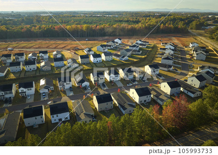 View from above of densely built residential houses in living area in South Carolina. American dream homes as example of real estate development in US suburbs 105993733