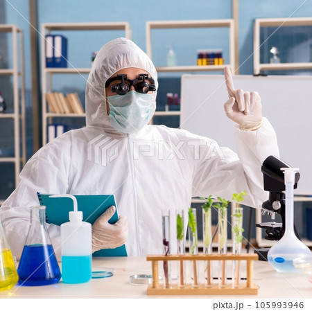 Male biotechnology scientist chemist working in the lab Male biotechnology scientist chemist working in the lab 105993946