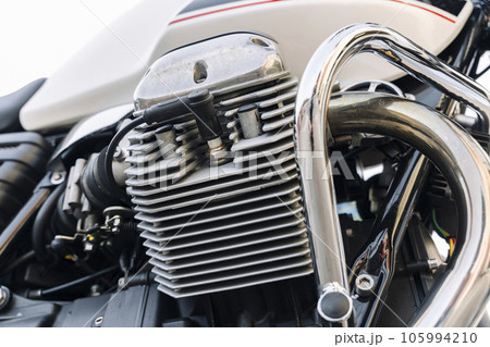 The engine of a classic motorcycle. side view. motor, cylinders, The engine of a classic motorcycle. side view. motor, cylinders, 105994210