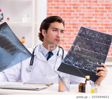 Young doctor working in hospital 105994601