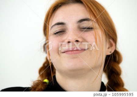 Close up portrait of redhead pretty teenage girl. 105995595