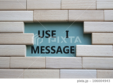 Use I message symbol. Wooden blocks with words Use I message. Beautiful grey green background. Business and Use I message concept. Copy space. 106004943