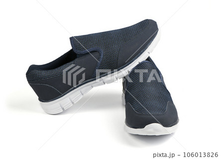 Pair of black fashionable stylish sports casual shoes isolated on white background 106013826