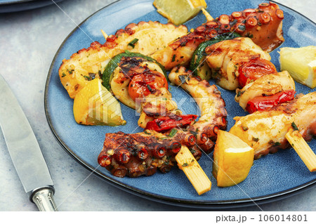 Seafood kebabs, octopus on skewers. Seafood kebabs, octopus on skewers. 106014801