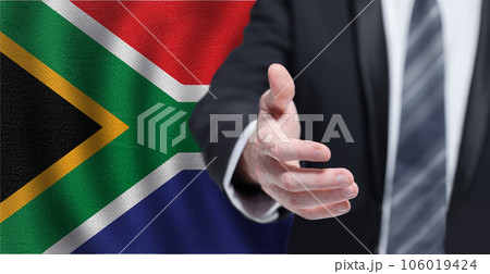 RSA business, politics, cooperation and travel concept. Hand on flag of South Africa background. RSA business, politics, cooperation and travel concept. Hand on flag of South Africa background. 106019424