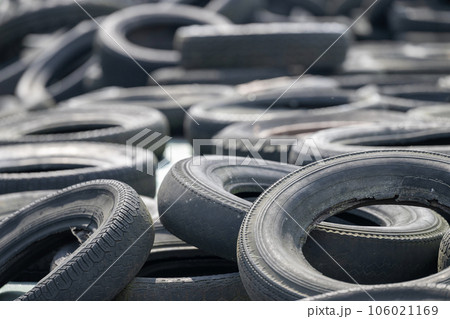 Old car tires on silaged fodder on a dairy farm Old car tires on silaged fodder on a dairy farm 106021169
